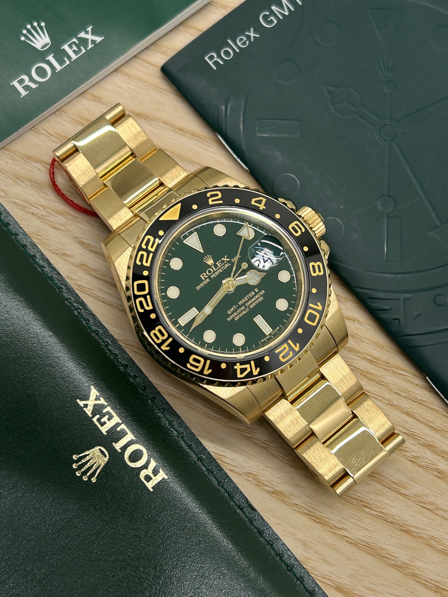 Rolex GMT-Master II - 18Kt Yellow Gold- Green Dial - Ref 116718LN - Year 2015