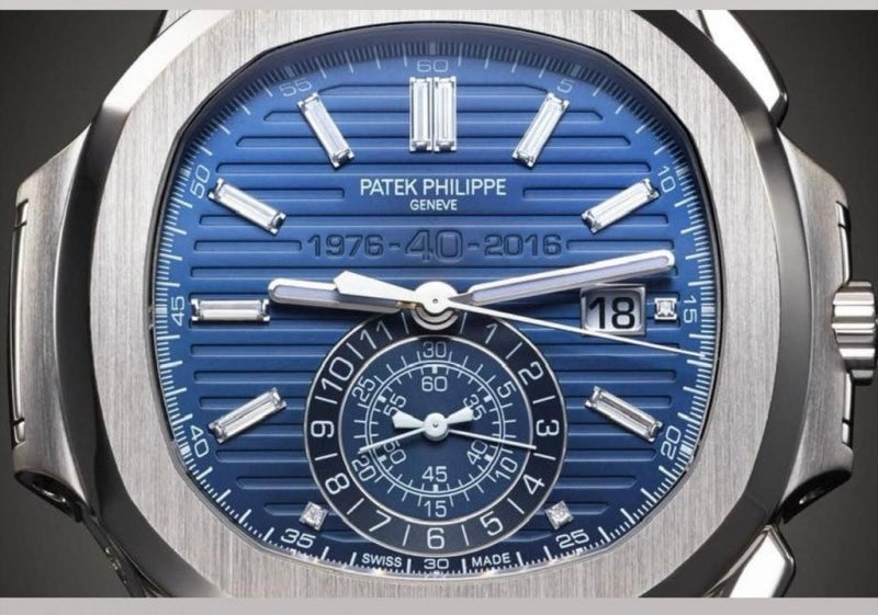 Patek Philippe Nautilus 5976/1G Chrono 40th Anniversary - White Gold Blue Dial Baguette - Factory Sealed