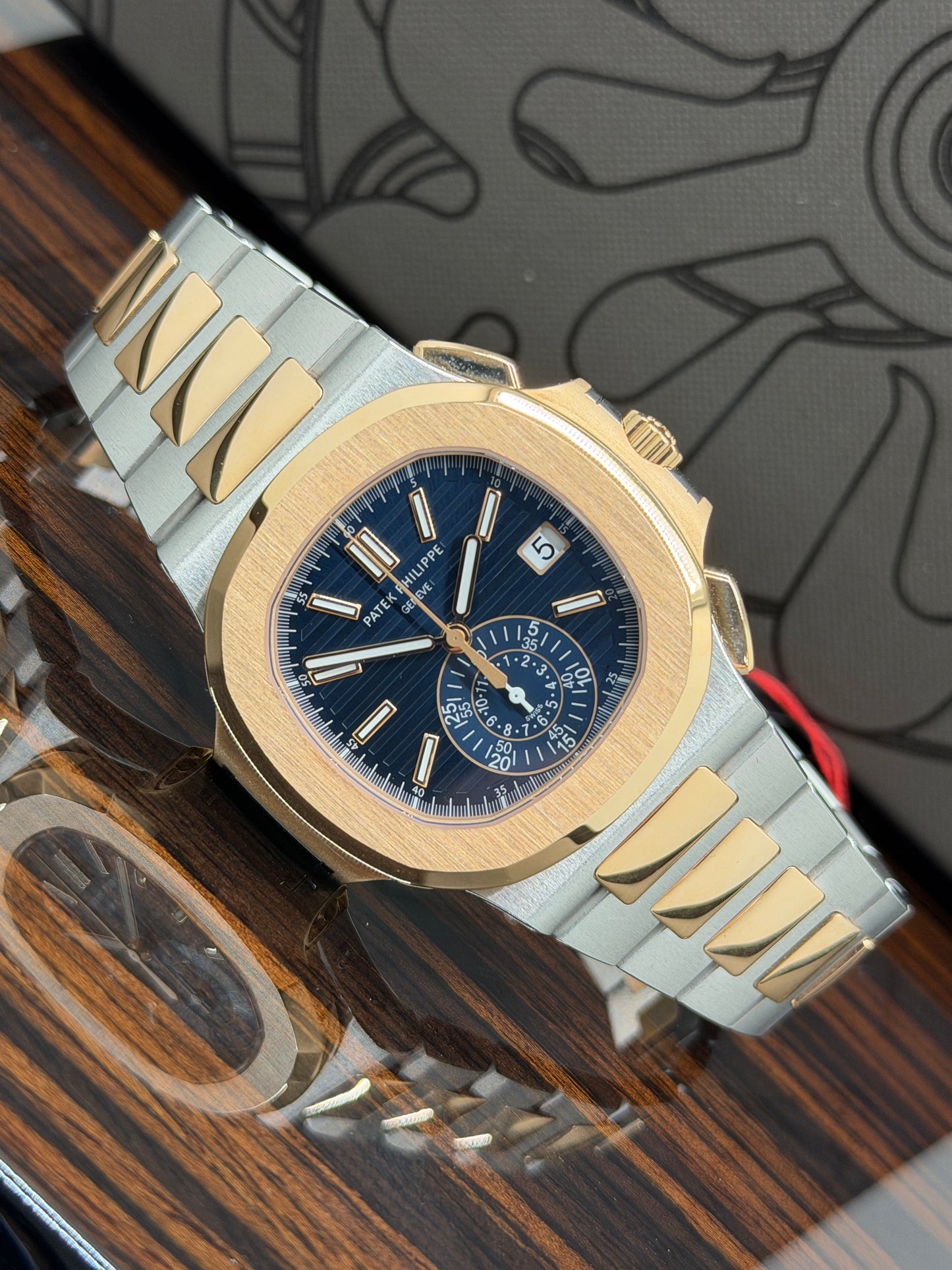 Patek Philippe Nautilus Blue Dial - 18Kt Yellow Gold & Steel Ref. 5980/1AR-001 - Unworn - Year 2021