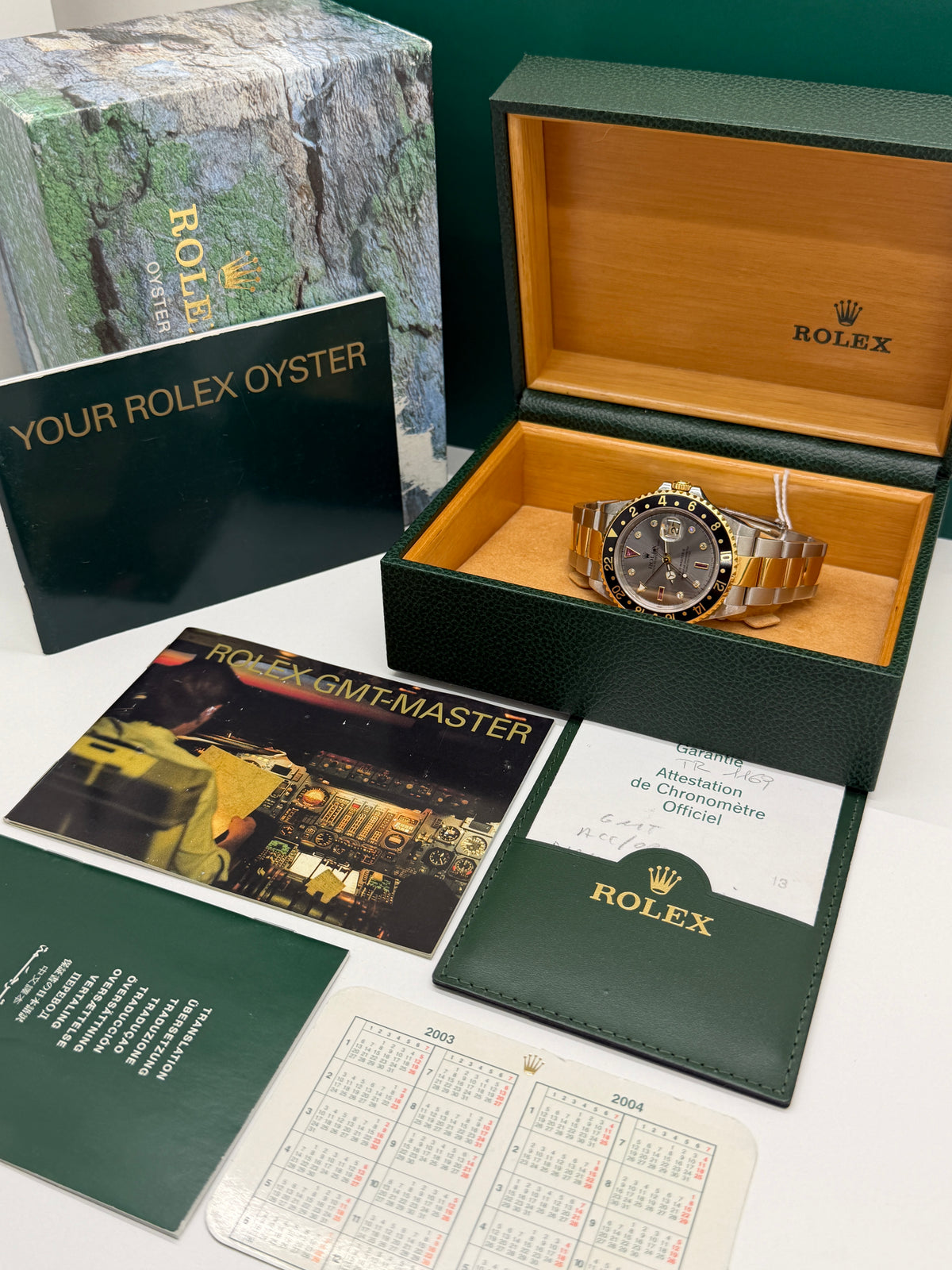 Rolex GMT-Master II Rare Grey Ruby Serti Dial - Unpolished - Year 2003 Ref 16713 - Yellow Gold & Steel