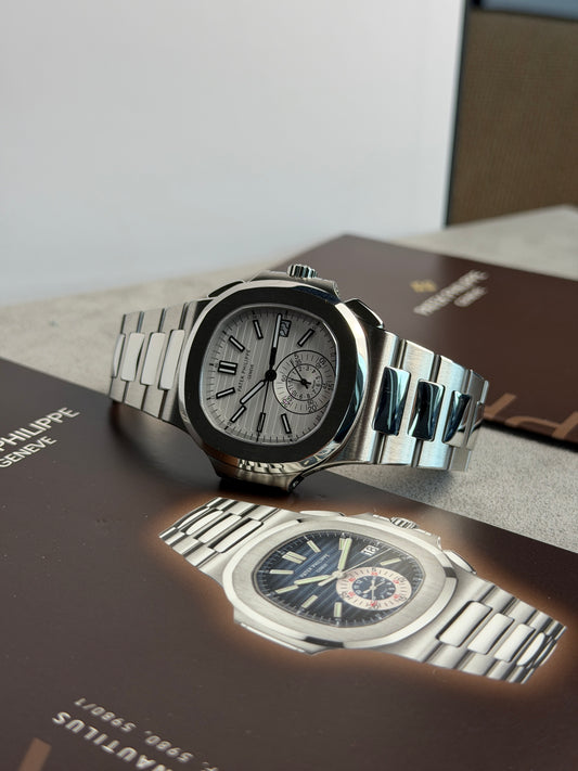 Patek Philippe Nautilus Chronograph - White Dial - Ref 5980/1A-019 - Year 2013 Official PP Service 2026