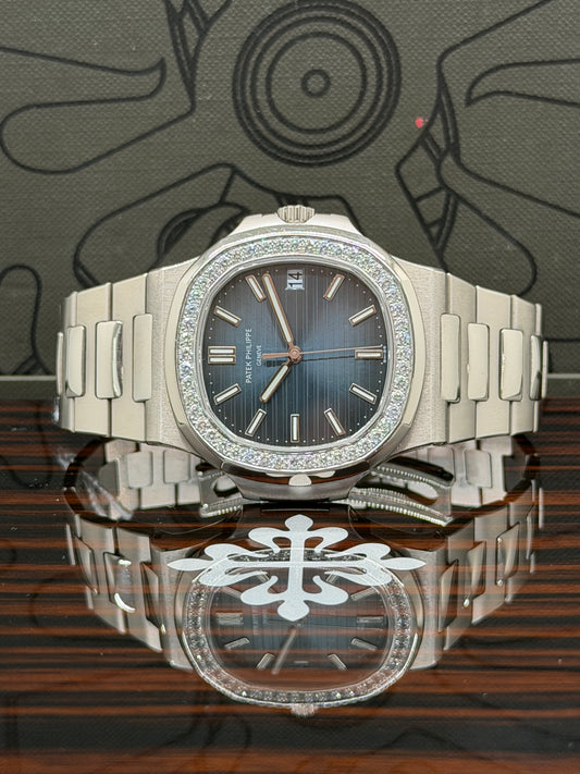 Patek Philippe Nautilus - Blue Dial -18kt White Gold - Diamond Bezel - Ref 5713/1G-010 - Year 2011