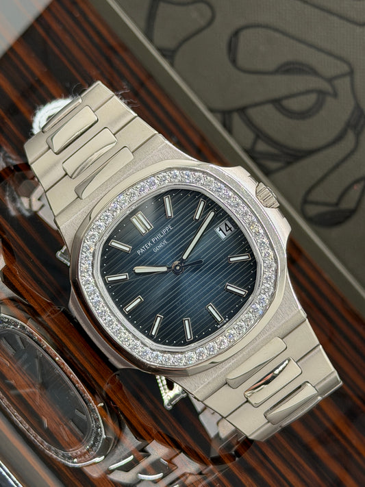 Patek Philippe Nautilus - Blue Dial -18kt White Gold - Diamond Bezel - Ref 5713/1G-010 - Year 2011