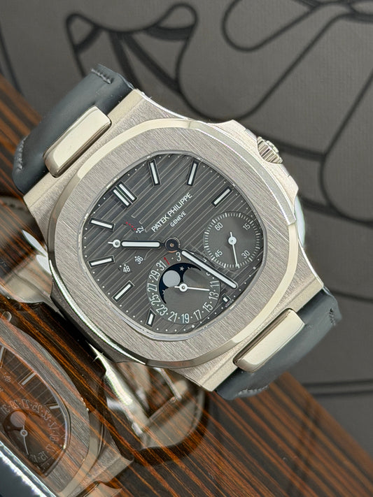Patek Philippe Nautilus Ref. 5712G-001 - White Gold - Grey Dial Like New - Double Strap - Year Dec 2023