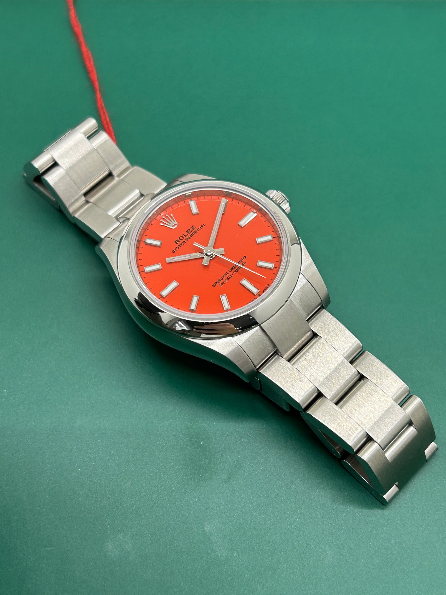 Rolex Oyster Perpetual 31 - Coral Red Dial - Ref 277200 - New 2022
