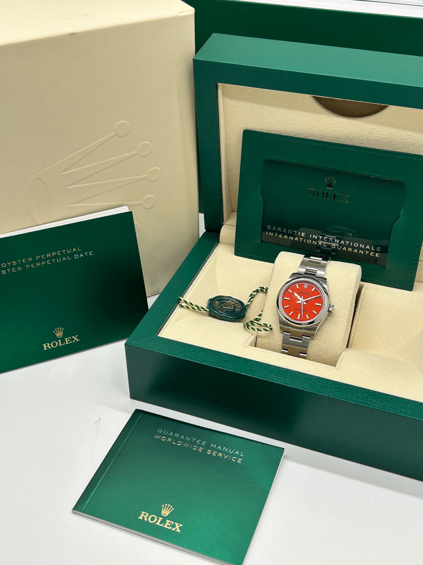 Rolex Oyster Perpetual 31 - Coral Red Dial - Ref 277200 - New 2022