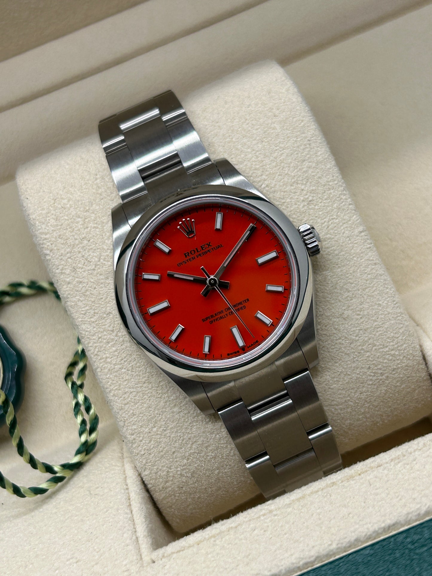 Rolex Oyster Perpetual 31 - Coral Red Dial - Ref 277200 - New 2022